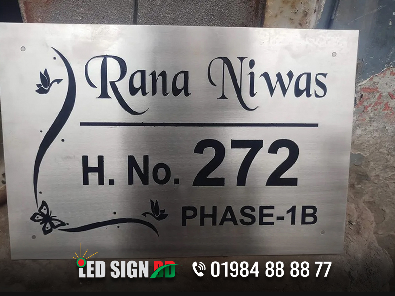 rana niwas name plate, Led sign BD ltd providing and designing all kind of Name Plate in Bangladesh. You can get a price or quotation from led sign bd ltd for collects your dream Name Plate signage. Name Plate signage is the best lightweight and portable solution for you’re on the go display needs. Name Plate signage Price in Dhaka Bangladesh. We are working with Name Plate signage since 2006 inside Dhaka and outside Dhaka in Bangladesh. Call our team: +88 01984888877 Name Plate BD, Name Plate Design BD, Name Plate Company, Name Plate company in Dhaka Bangladesh, Bike name plate, wood name plate, house name plate, office name plate provider in Bangladesh, name plate price in Bangladesh, Office name plate, fiber board name plate, metal name plate, wood name plate, Glass name plate price in Bangladesh, House name plate in Bengali, door name plate design in Bangladesh, House name plate design, bari name plate design bd, Best Name Plates Stainless Steel Makers Price in Dhaka Bangladesh, Pocket Name plate provider in Bangladesh, Steel name plate designer bd, Name plate holder in Bangladesh, Name plate design for main gate, Doctor name plate in Bangladesh.