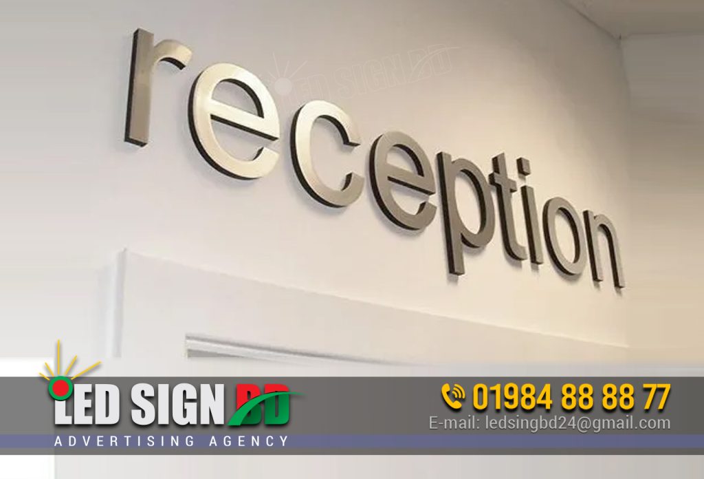 Reception Nameplate Design in Dhaka Bangladesh, SS Stainless Steel Top Letter Price in Bangladesh Leave a Comment / LED Acrylic Sign / By LED Sign The price of stainless steel (SS) top letters in Bangladesh can vary depending on various factors such as size, thickness, design complexity, finishing, and the supplier or manufacturer you choose. The prices mentioned here are approximate and may vary: SS Stainless Steel Top Letter Price in Bangladesh. SS Stainless Steel Top Letter Price in Bangladesh Small-sized SS top letters (6 inches to 12 inches): Price range of BDT 500 to BDT 1,500 per letter. Medium-sized SS top letters (12 inches to 24 inches): Price range of BDT 1,500 to BDT 4,000 per letter. Large-sized SS top letters (24 inches to 48 inches): Price range of BDT 4,000 to BDT 10,000 per letter. It’s important to note that these prices are estimates and can vary based on your specific requirements and the supplier you choose. Additionally, prices can be influenced by factors such as the type of stainless steel used (e.g., 304 or 316 grade), the finish (e.g., brushed or polished), and any additional features or customization. To get an accurate price quote for your specific project, it’s recommended to contact local signage companies or stainless steel fabricators in Bangladesh. They can provide you with detailed pricing information based on your design specifications and other requirements. SS Letter Signs Price The price of acrylic letters in Bangladesh can vary based on factors such as size, thickness, design complexity, finishing, and the supplier or manufacturer you choose. Here is an approximate price range for acrylic letters in Bangladesh: Small-sized acrylic letters (6 inches to 12 inches): Price range of BDT 200 to BDT 500 per letter. Medium-sized acrylic letters (12 inches to 24 inches): Price range of BDT 500 to BDT 1,500 per letter. Large-sized acrylic letters (24 inches to 48 inches): Price range of BDT 1,500 to BDT 4,000 per letter. It’s important to note that these prices are estimates and can vary based on your specific requirements and the supplier you choose. The prices can also be influenced by factors such as the thickness of the acrylic, the type of finishing (e.g., glossy or matte), any additional features or customization, and the complexity of the design. To get an accurate price quote for your specific project, it’s recommended to contact local signage companies or acrylic letter manufacturers in Bangladesh. They can provide you with detailed pricing information based on your design specifications and other requirements.